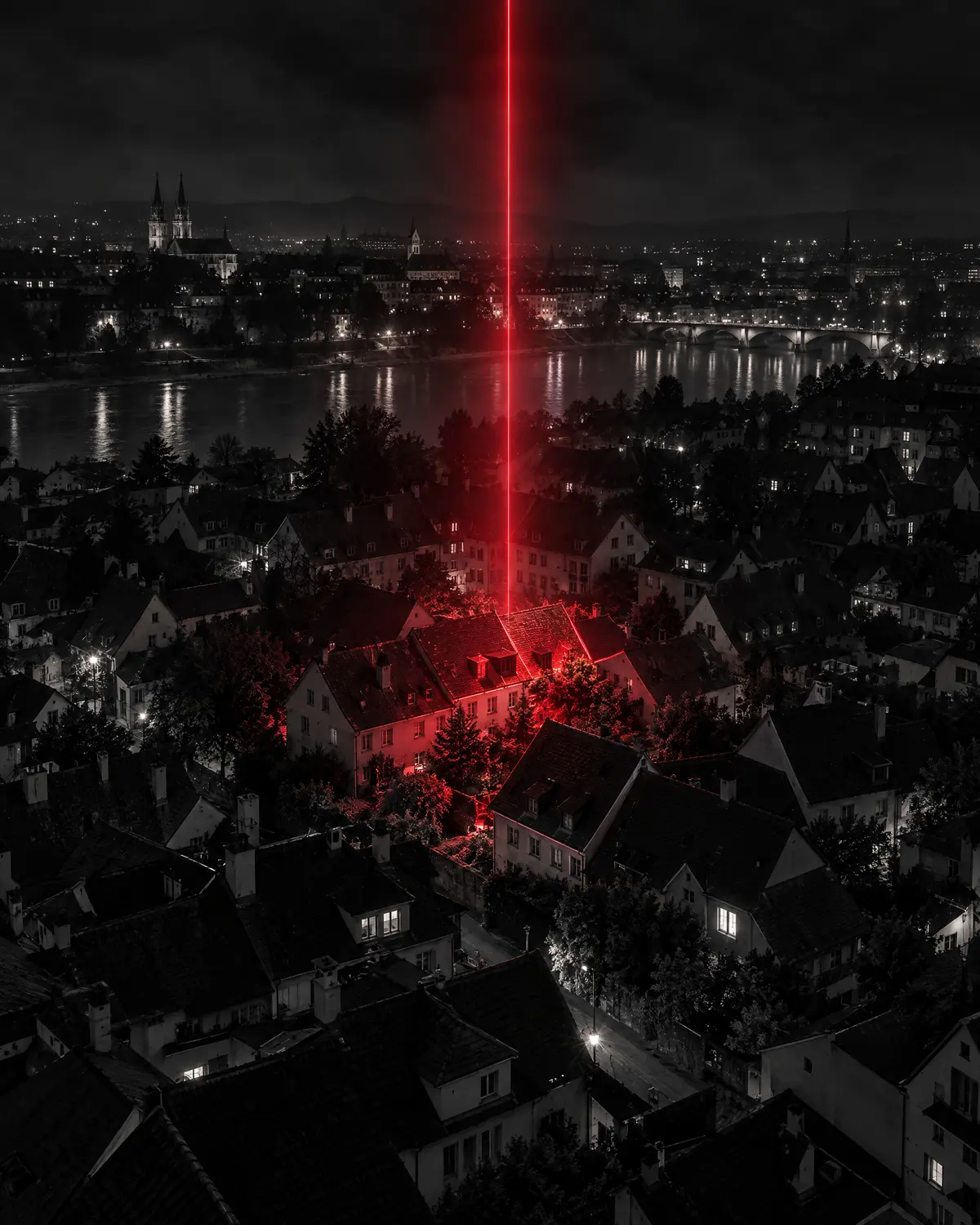 Basler Wohnquartier bei Nacht von oben, ein Häuserblock rot angestrahlt als Sinnbild für Werbung genau im Einzugsgebiet